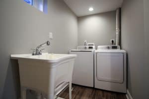 Wash and laundry room with brand new washer and dryer
